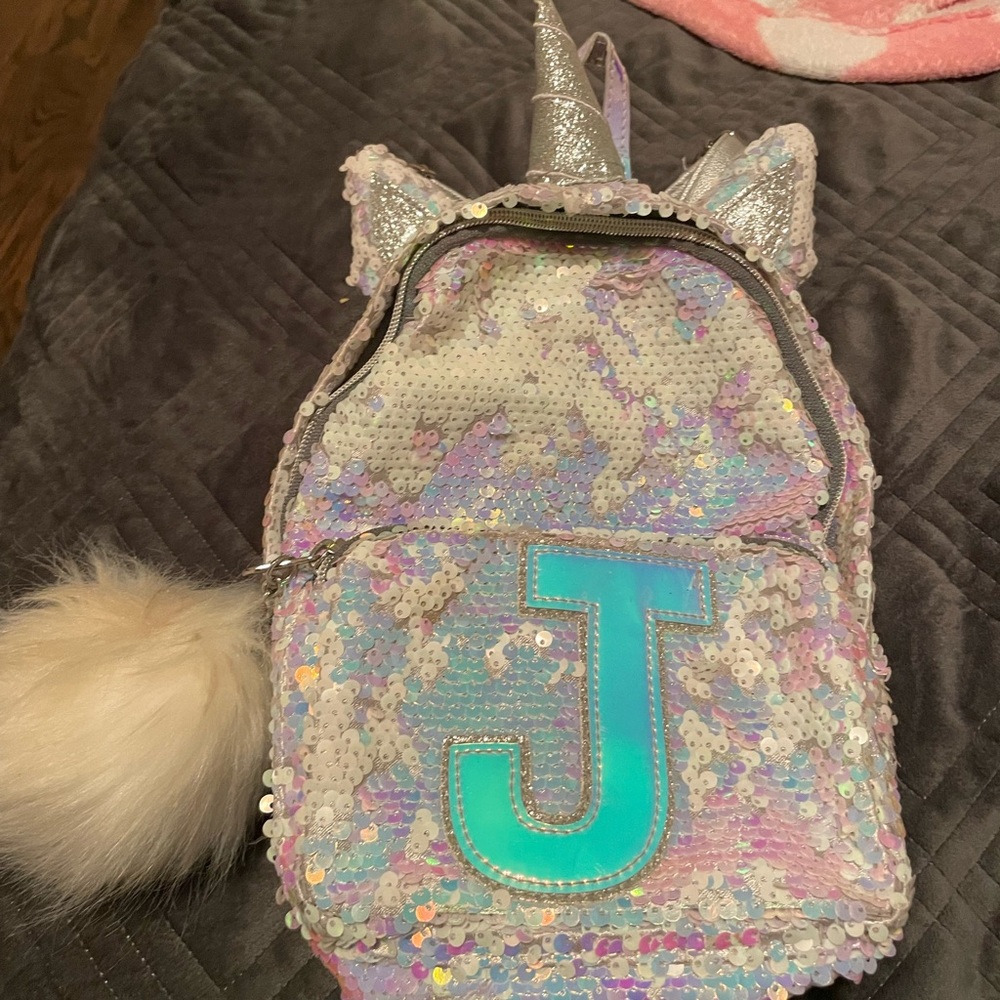 Mini white sequinned backpack from Justice
